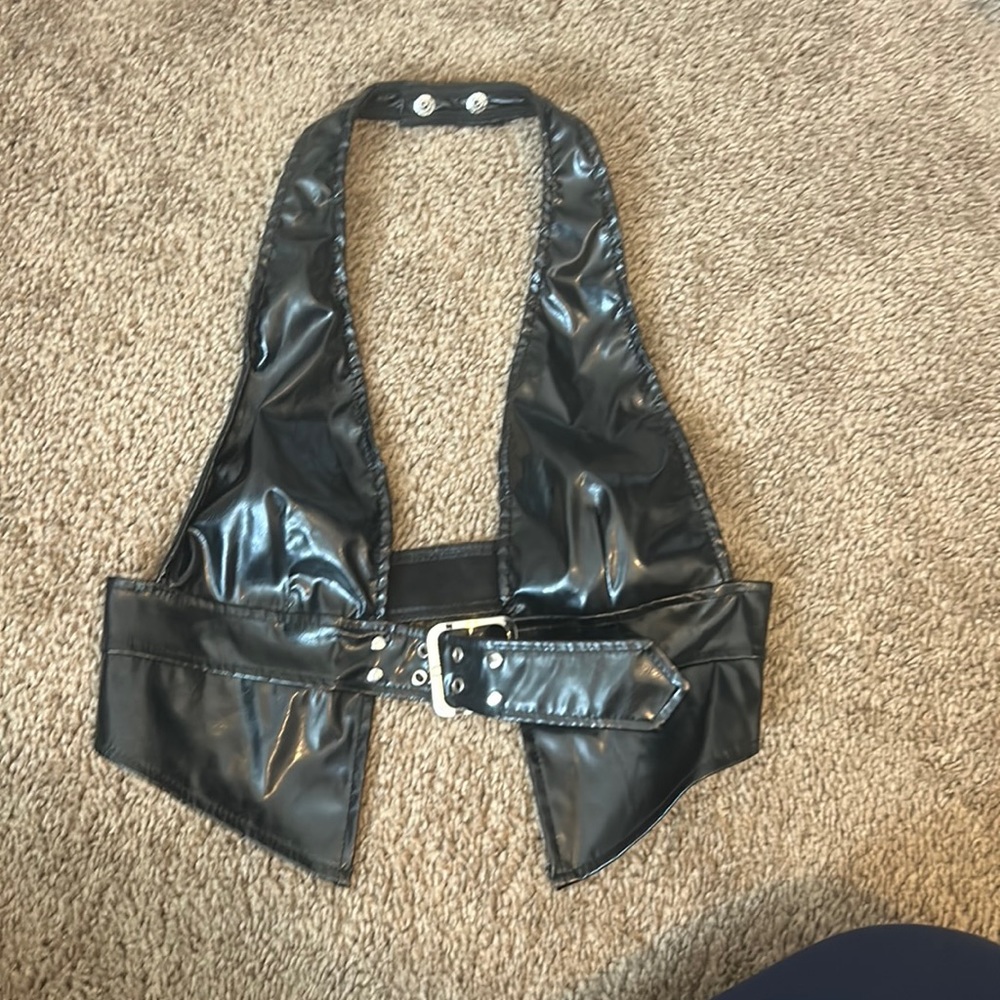 Metallic black gojng out top Xs buckle
